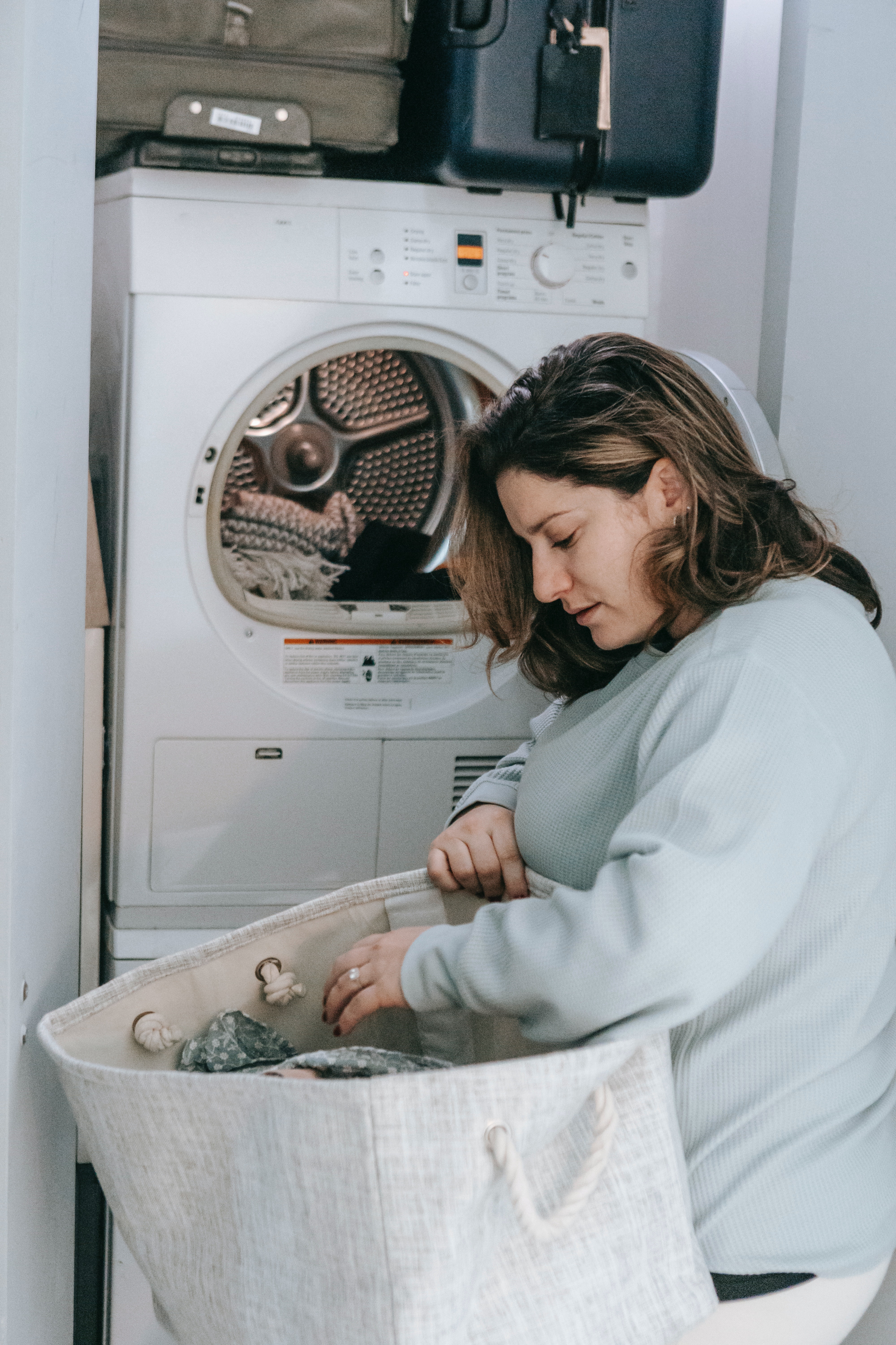 A Woman choosing clothes for washing